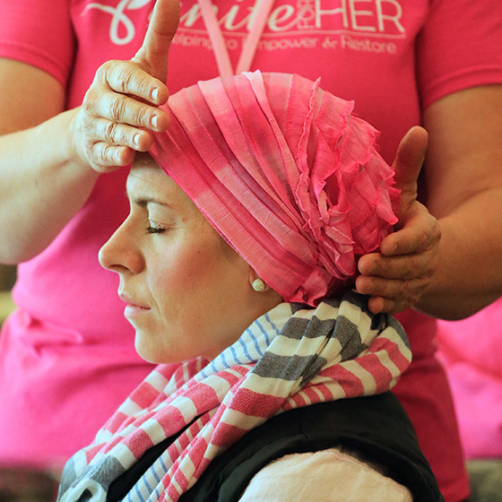 reiki Unite for HER member receiving reiki