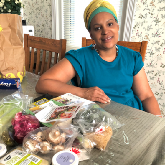 Fatima Unite for HER wellness program member with nutritional meal provided by the Wellness Passport Program